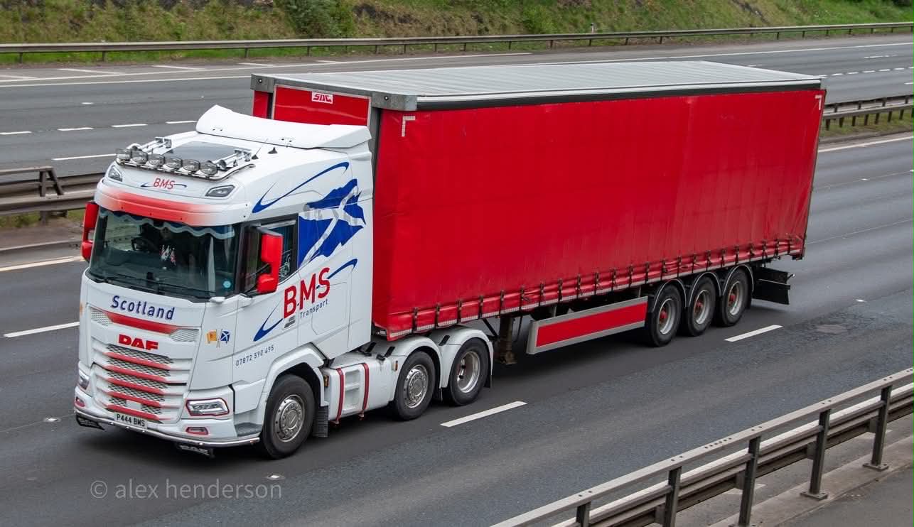 BMS Transport truck with red curtainsider